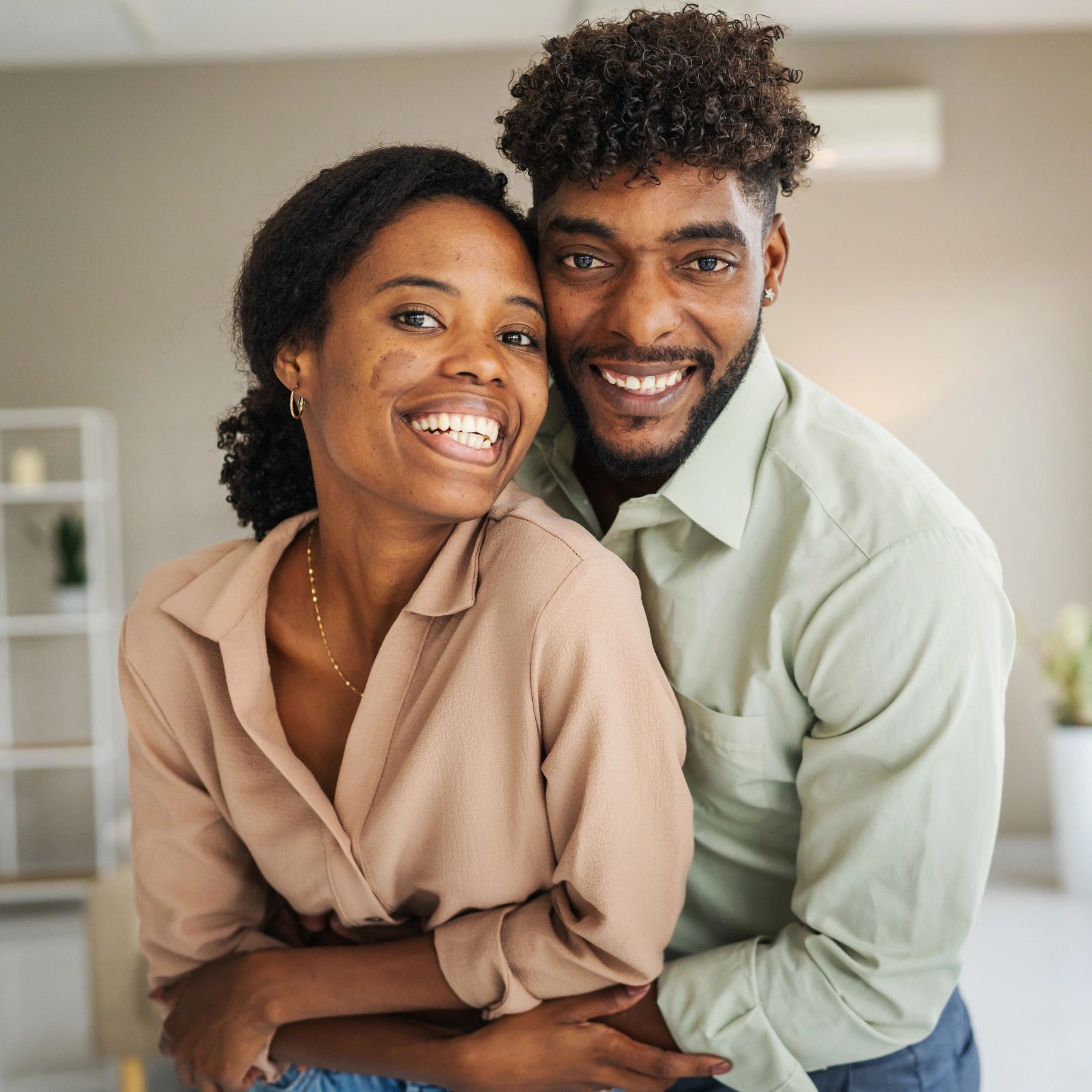 Happy homeowners at home